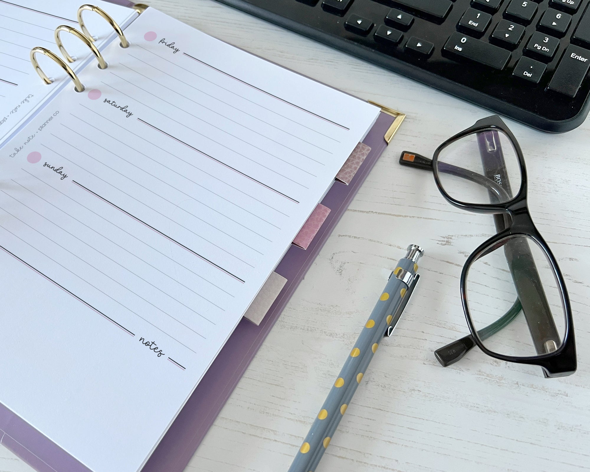 Open planner with a set of 3 magnetic page markers