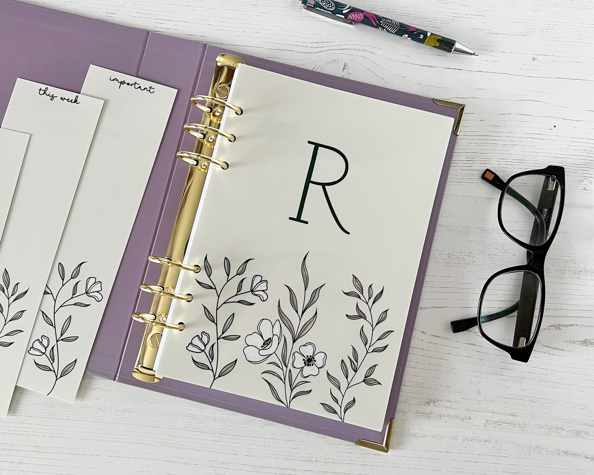 Purple ring binder with floral dashboard cover in a floral design