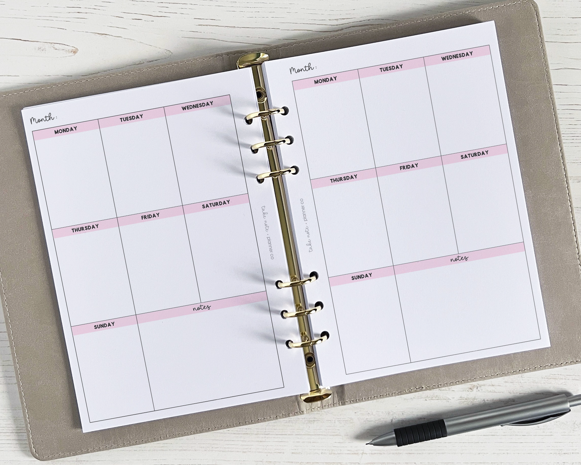 A set of undated A5 weekly planner inserts with a smart, classic design, featuring a weekly spread with vertical layout.