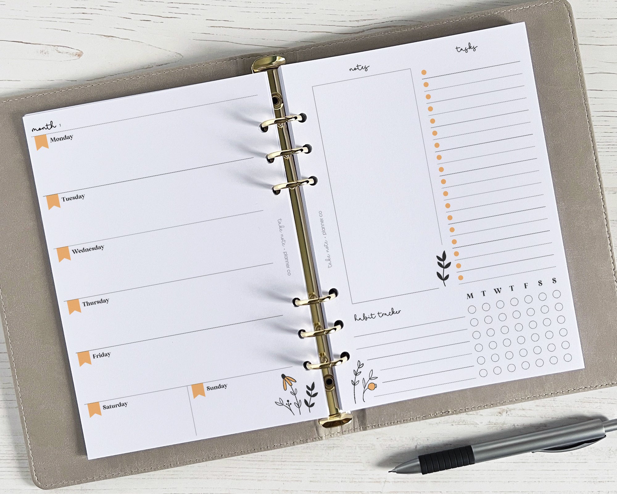 A floral undated weekly planner with space for notes and weekly planning.