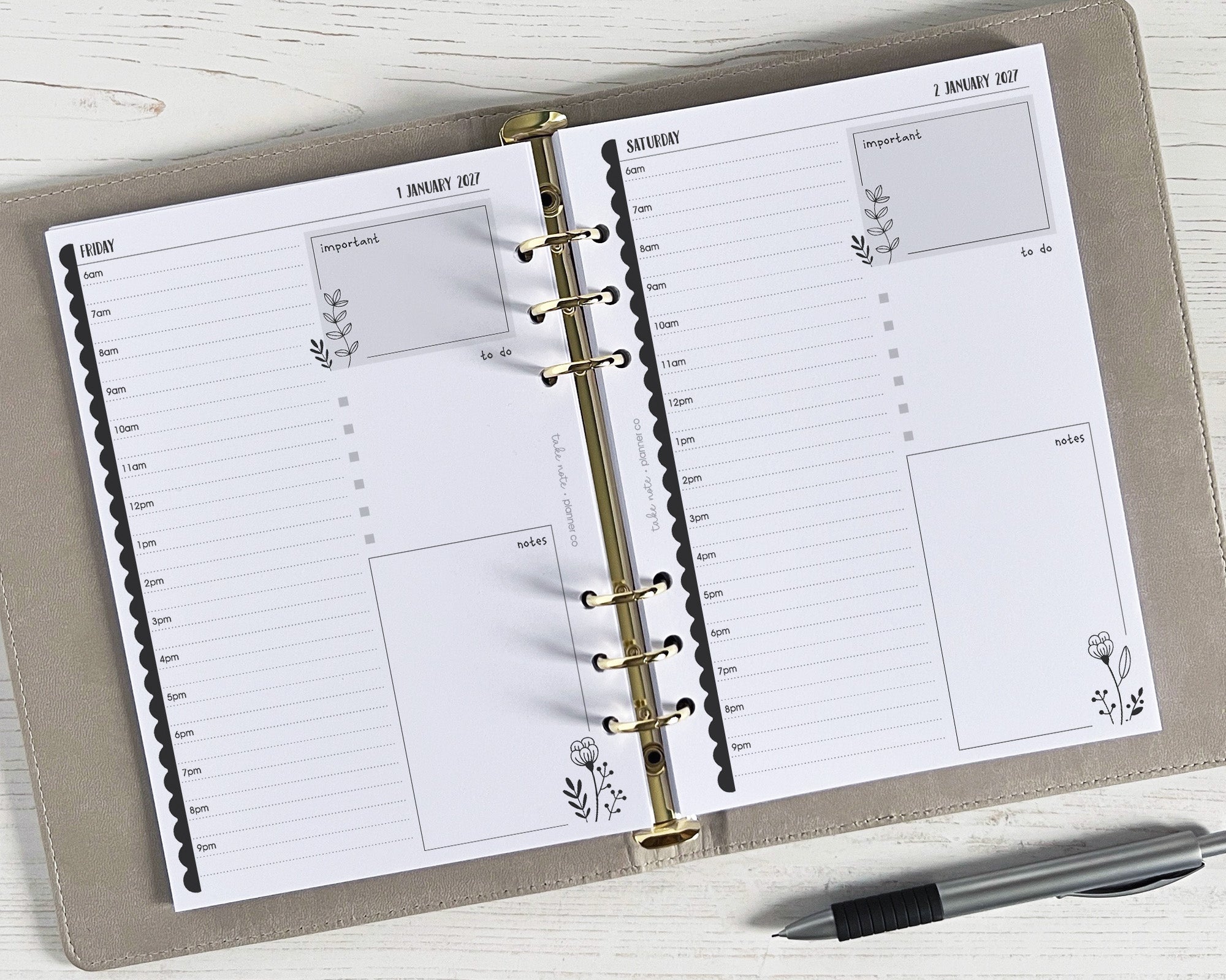 A5 daily planner inserts with a monochrome floral design, featuring a day-to-page layout with sections for notes, to-do list, and priorities/events. 