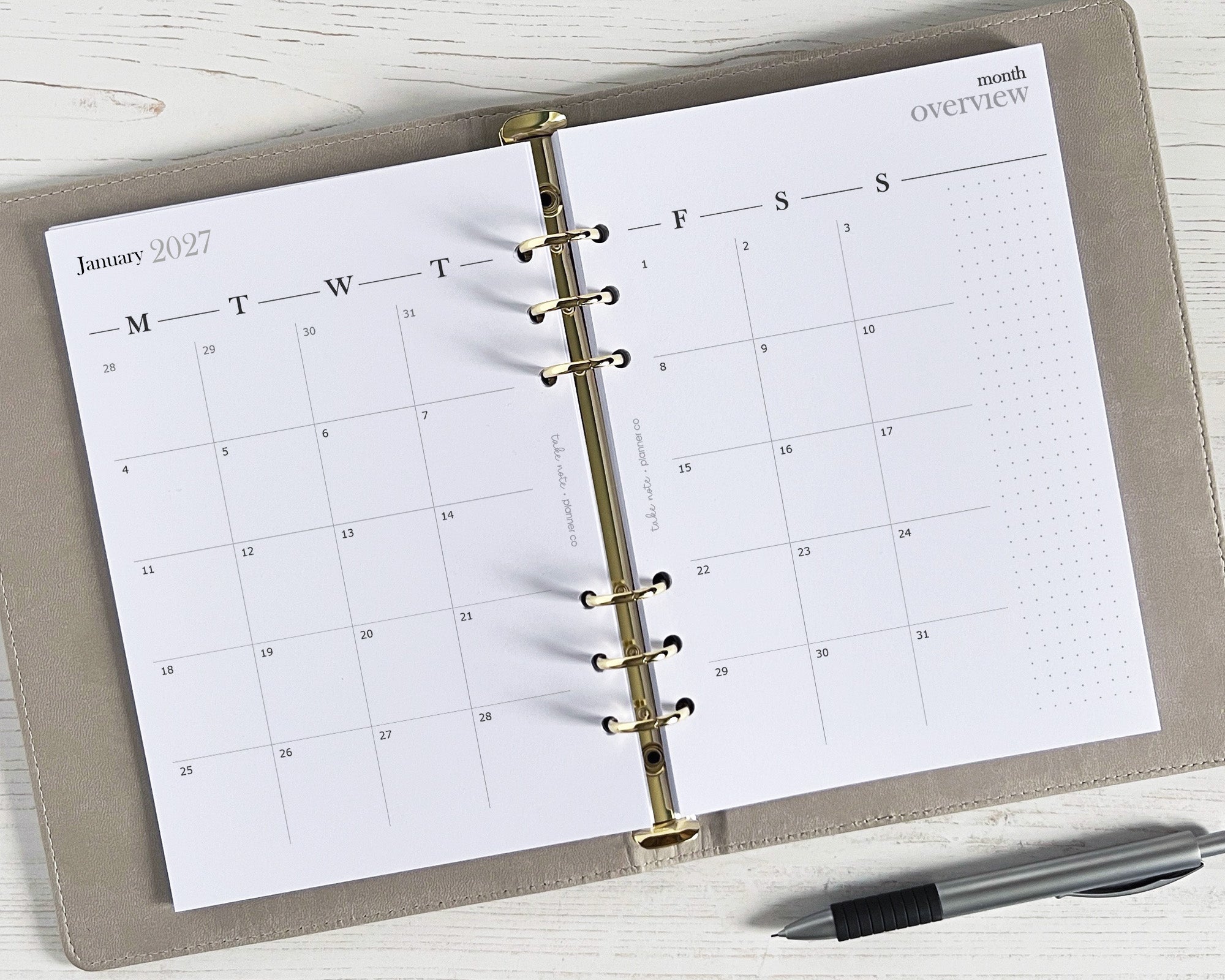 open ringbinder with monthly planner pages